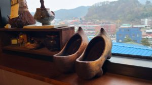 wooden shoes by a window in korea